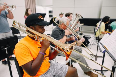 Marques playing the tuba